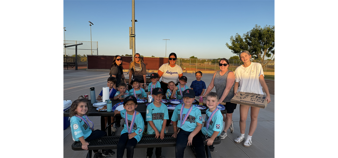 2024 T-ballers celebrating their season with pizza & medals